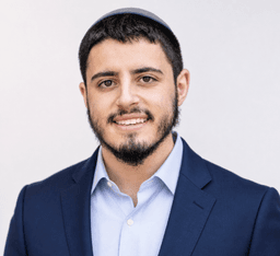 Professional headshot of Mendel Jacobs